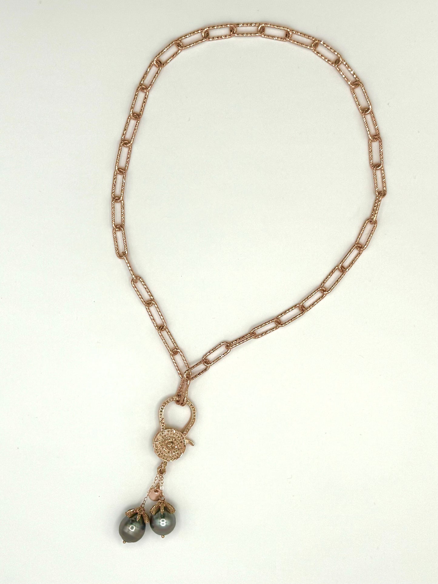 Eye of Glamour: Rose Gold Necklace with Diamond-Capped Tahitian Pearls and Diamond Evil Eye Clasp